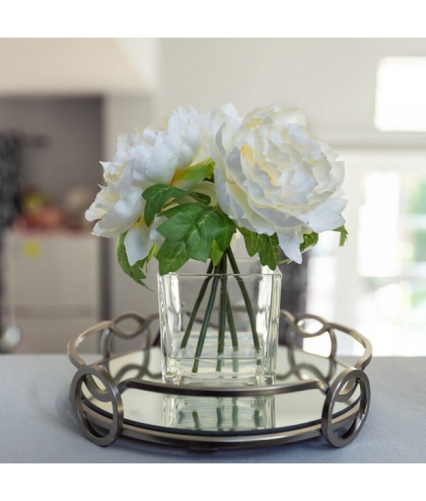 Peony flower arrangement and centerpiece in glass vase