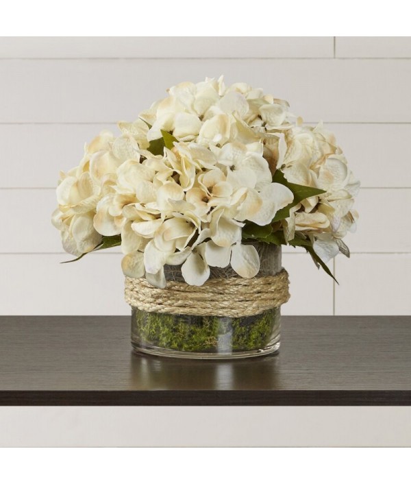 Hydrangea flower arrangement in classic round vase