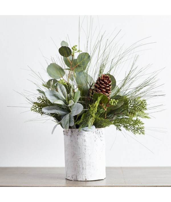 Mixed flower arrangement of greenery and pine cones