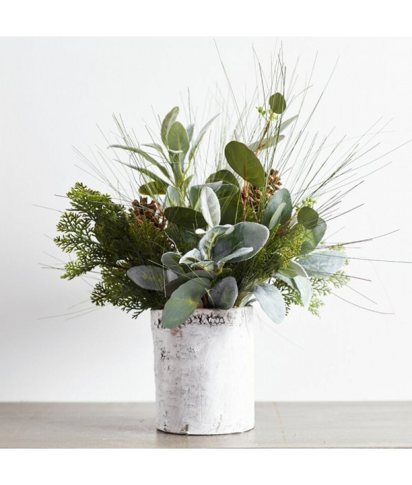 Mixed flower arrangement of greenery and pine cones